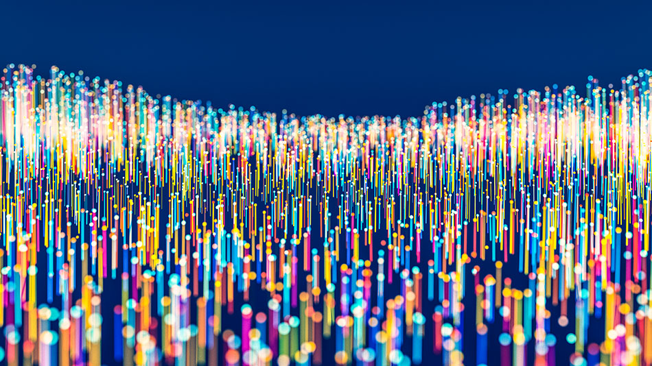 Thousands of lighted filaments in various colors standing on end