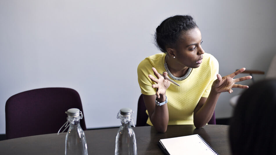 woman talking in conference room